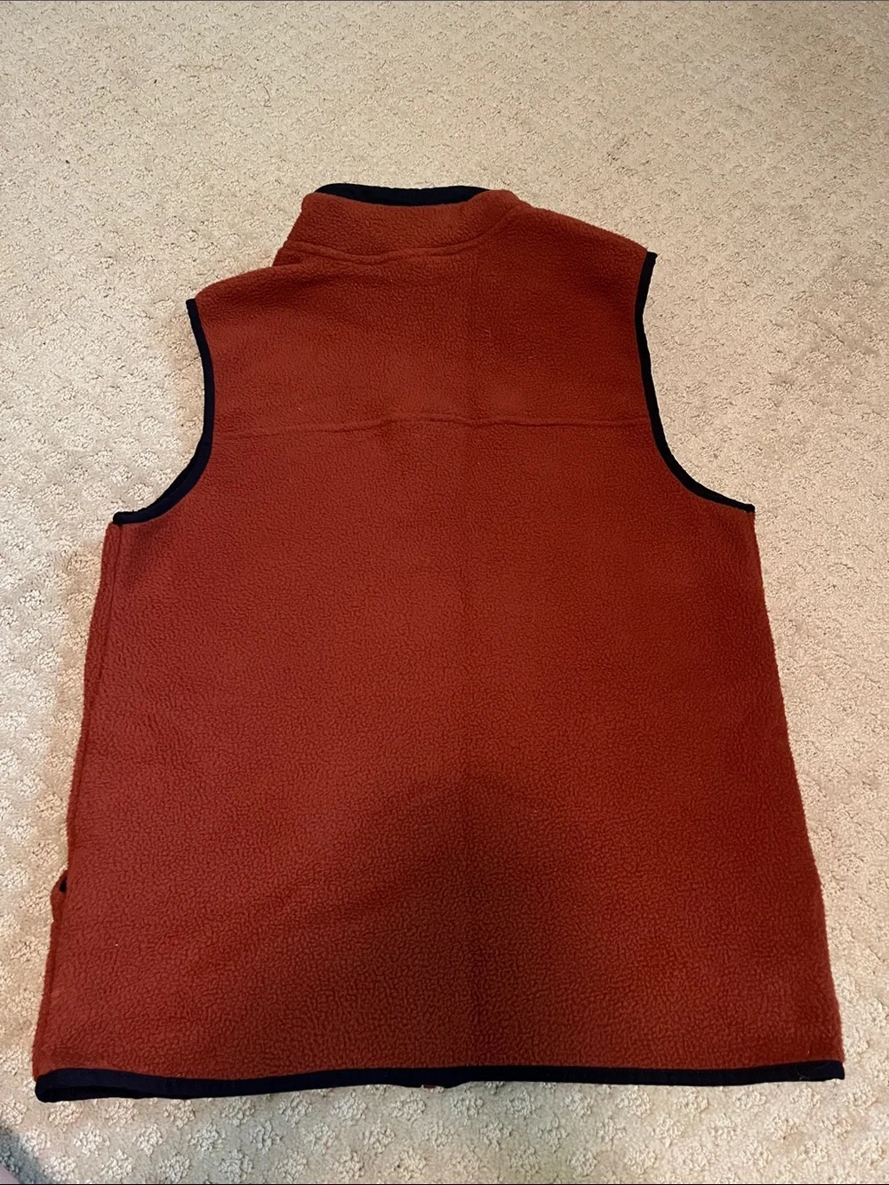 The North Face: Men's Burnt Orange Fleece Vest with Contrast Trim